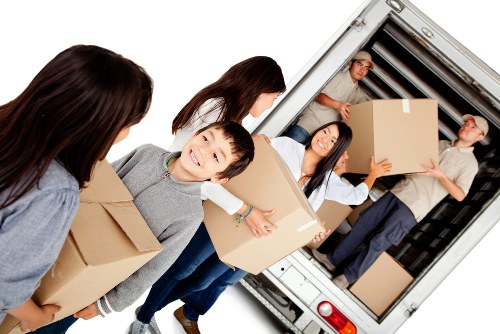 Feltham moving team sorting recyclable items into separate loads
