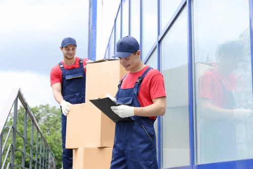 Loading goods into a moving van for a home or business relocation