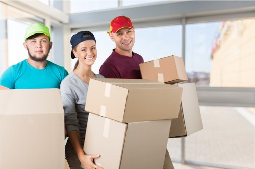 Removal van and moving boxes for a home move in Feltham