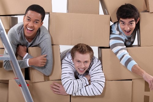 Removal team helping with a house move in Feltham