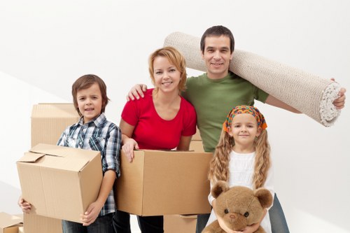 House movers loading items for a home removal in Feltham