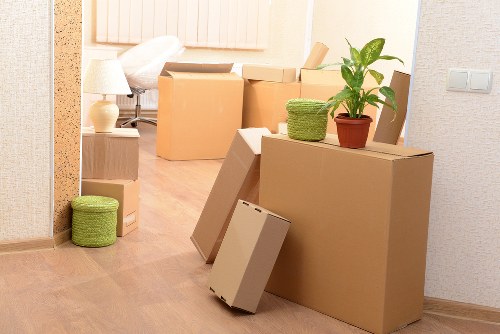 Household items being loaded carefully during a Feltham removal